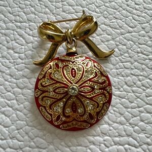 Monet Red Enameled white rhinestone Christmas Ornament pin with a gold tone bow